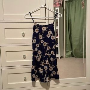 Adorable flower romper with an open back that ties-can wear anywhere!